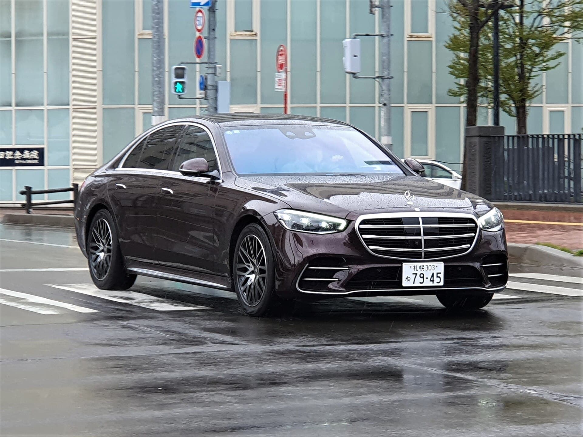 Mercedes S-Class sedan with bright chrome grille and star