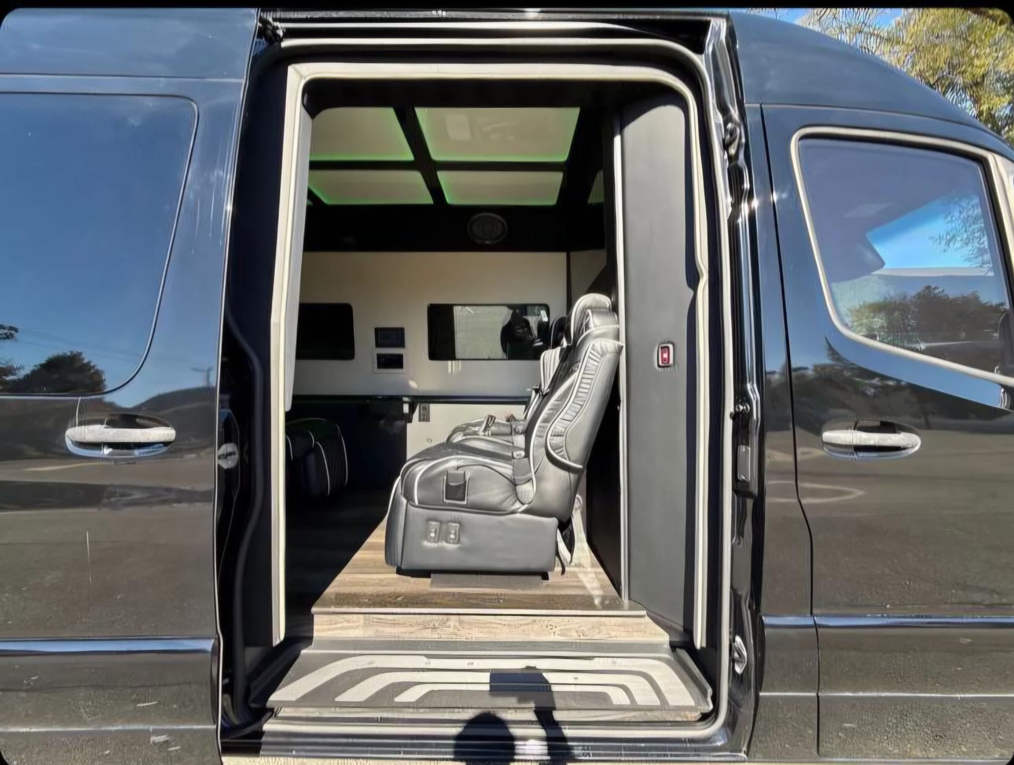 Black Jet Sprinter 778 with an open executive side door