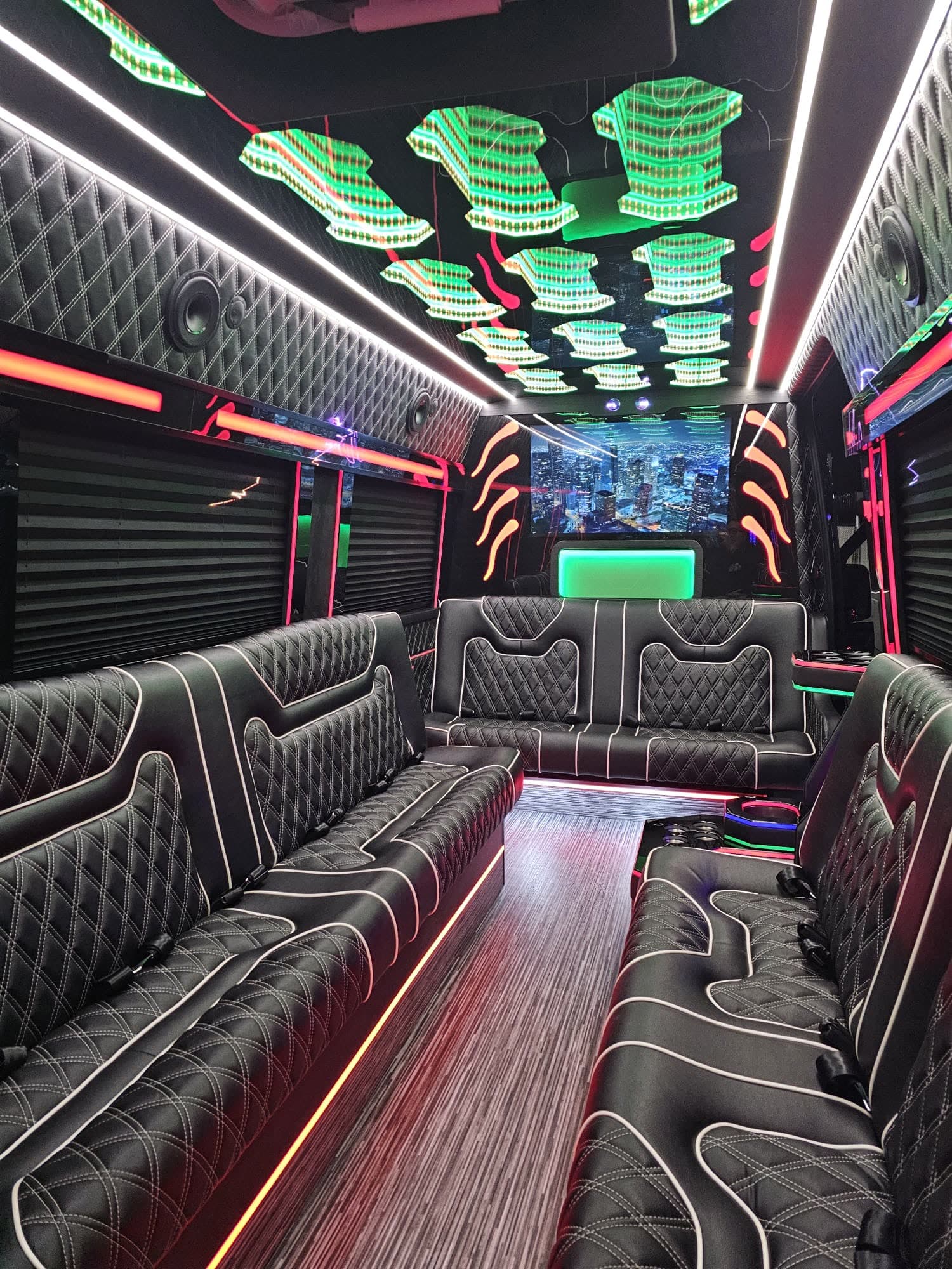 Limo Sprinter 761 dark luxury interior with quilted seating and ambient lighting